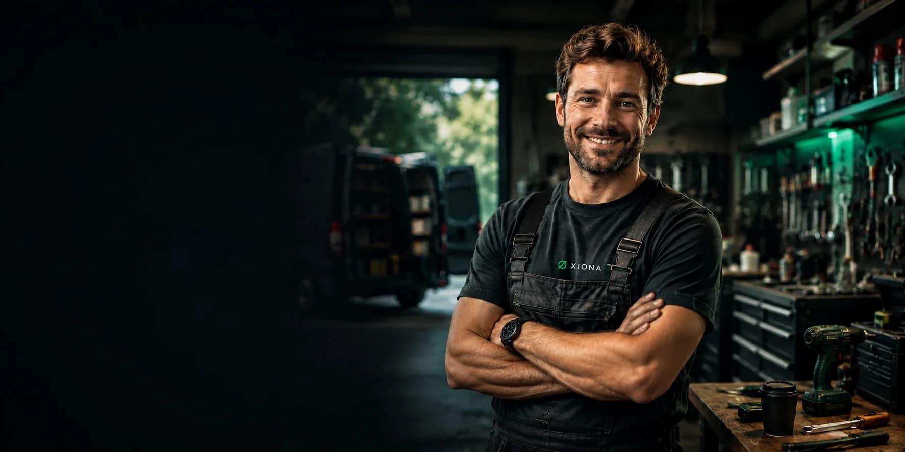 XIONA expert wearing a branded professional uniform in a workshop